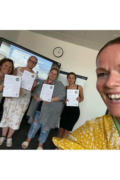 Marie-claire selfie with mental health first aider trained course members